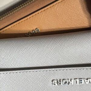 New without tags beautiful Michael Kors, leather wallets final sale